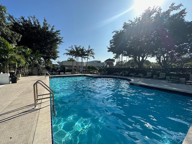 view of swimming pool featuring a patio