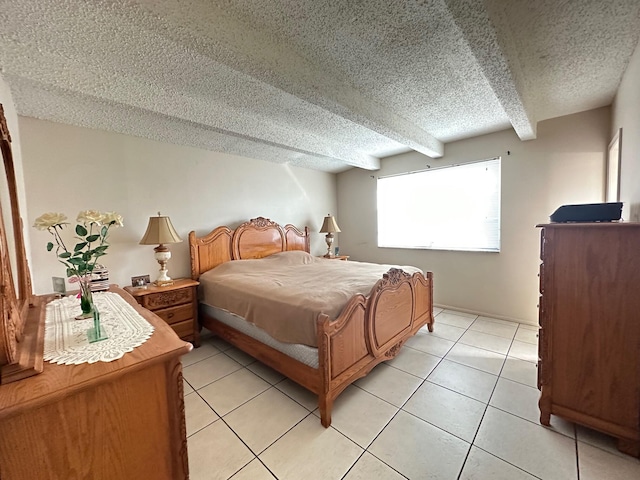 tiled bedroom featuring a textured ceiling