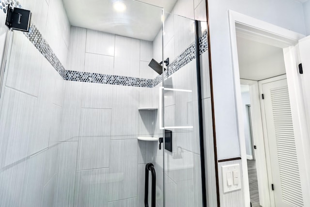 bathroom featuring walk in shower