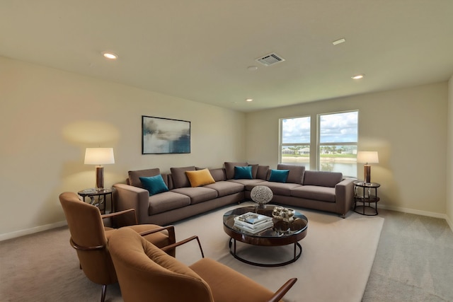 living room featuring light carpet