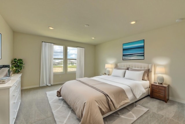 bedroom with light carpet