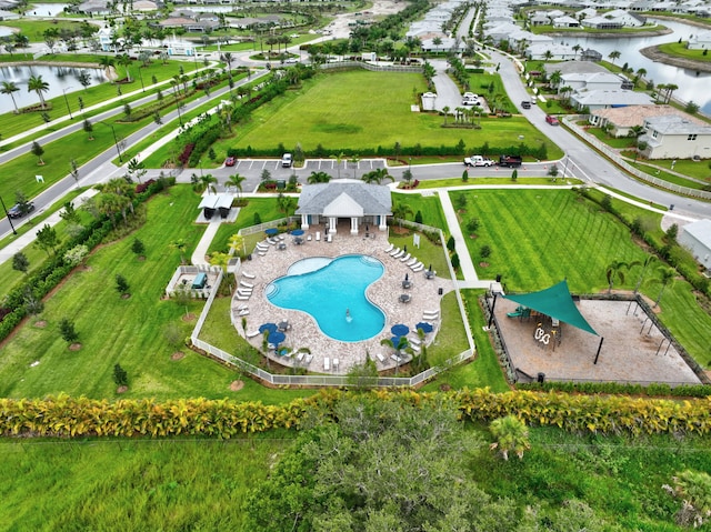 birds eye view of property featuring a water view