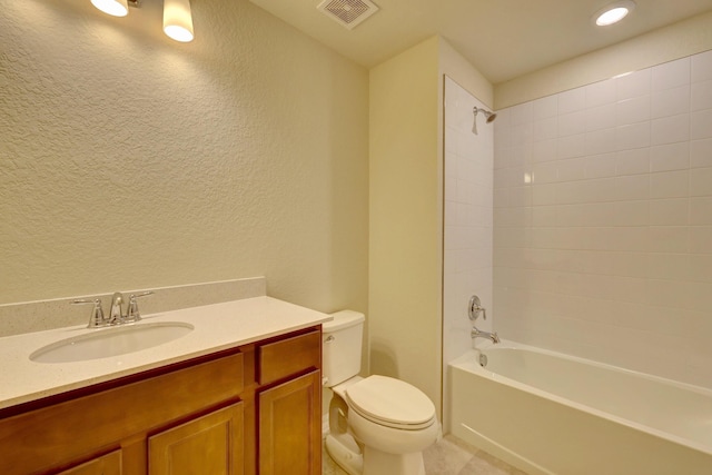 full bathroom with vanity, shower / bath combination, and toilet