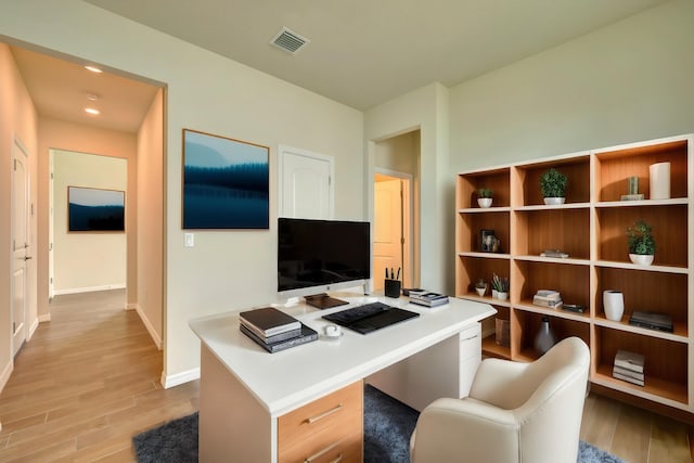 office space featuring light hardwood / wood-style flooring