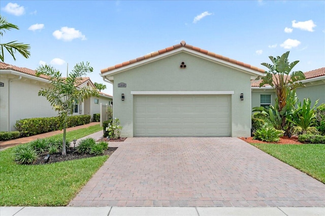 mediterranean / spanish-style house featuring a garage