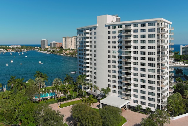 view of building exterior with a water view