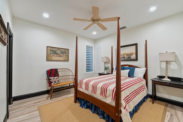 bedroom featuring ceiling fan and light hardwood / wood-style flooring