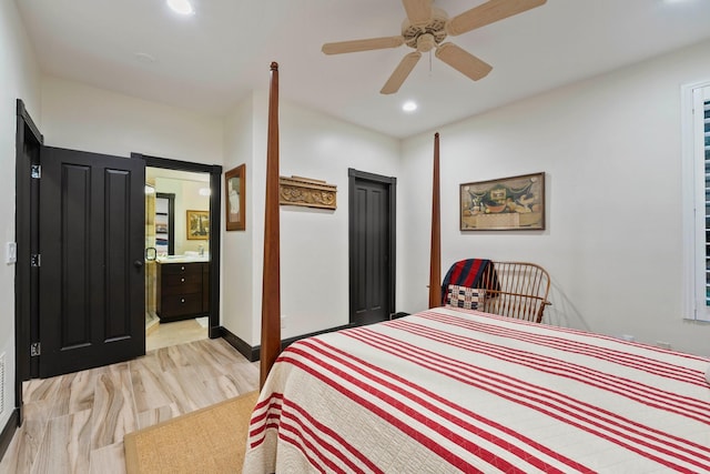 bedroom with ceiling fan, light wood-type flooring, and connected bathroom