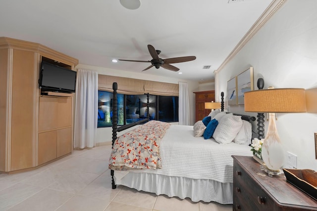 bedroom with light tile patterned floors, ceiling fan, and crown molding