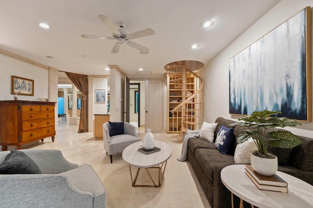 tiled living room with ceiling fan