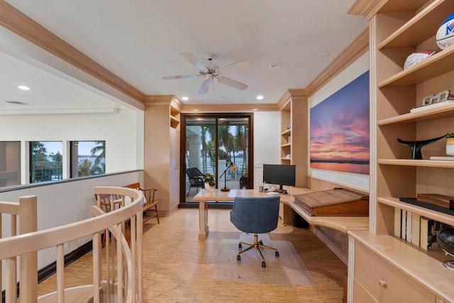 office space featuring built in shelves, light hardwood / wood-style flooring, ceiling fan, and ornamental molding