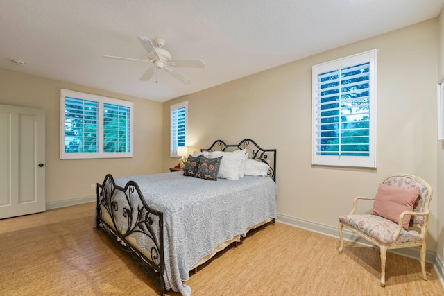 bedroom featuring ceiling fan