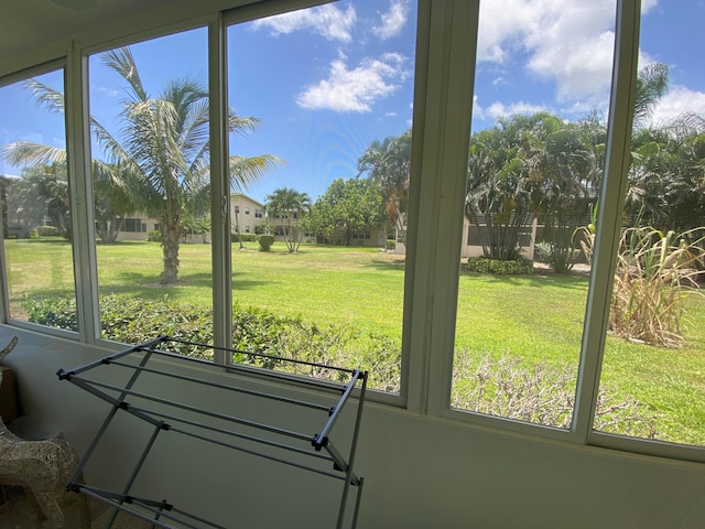 unfurnished sunroom with a wealth of natural light