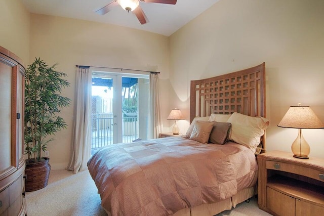 bedroom featuring access to outside, light carpet, lofted ceiling, and ceiling fan