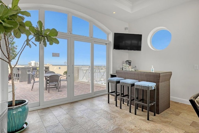 tiled dining space with plenty of natural light