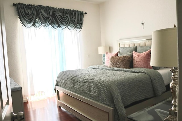 bedroom featuring hardwood / wood-style floors