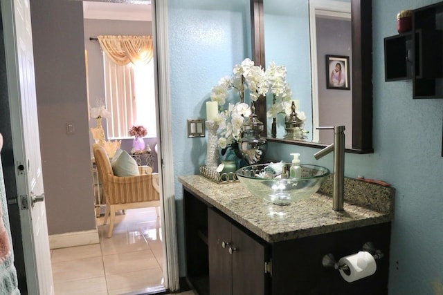 bathroom with vanity and tile patterned floors