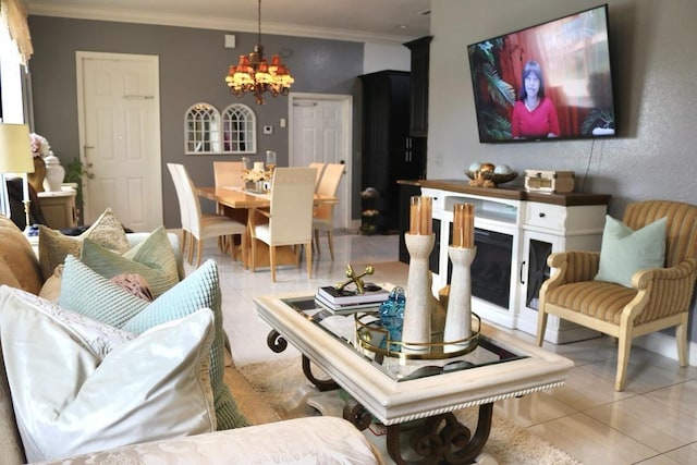 living room with an inviting chandelier, ornamental molding, and light tile patterned flooring