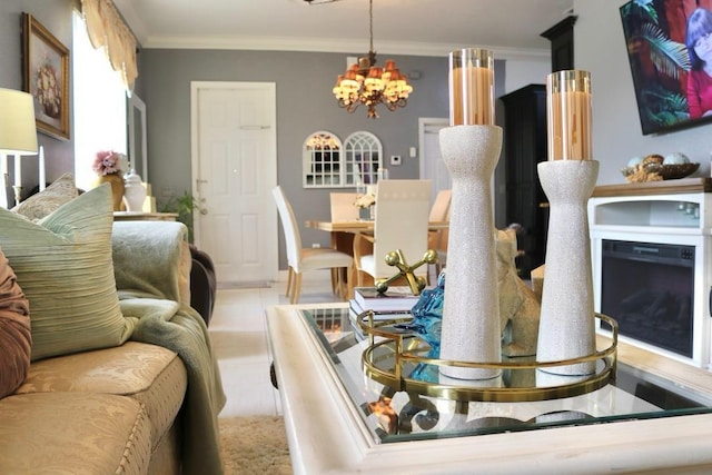 living room featuring light tile patterned floors, crown molding, and a chandelier