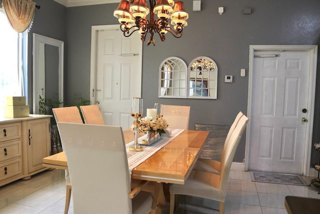 tiled dining area with an inviting chandelier