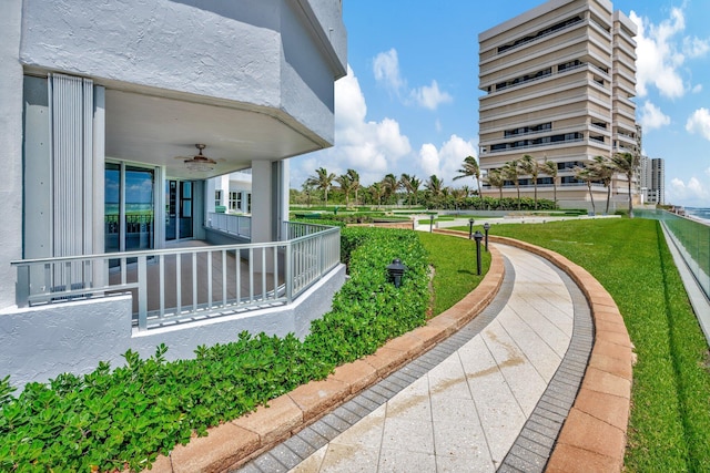 view of home's community featuring a yard