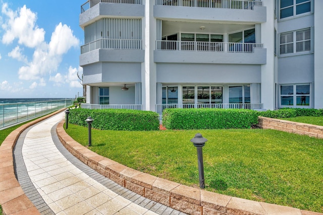 view of building exterior with a water view