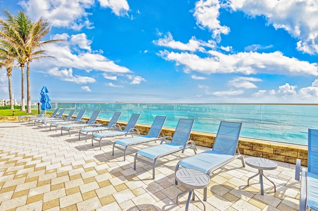 view of patio / terrace with a water view