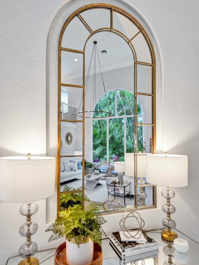 interior space with crown molding