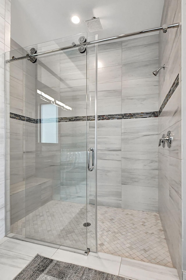 bathroom with an enclosed shower