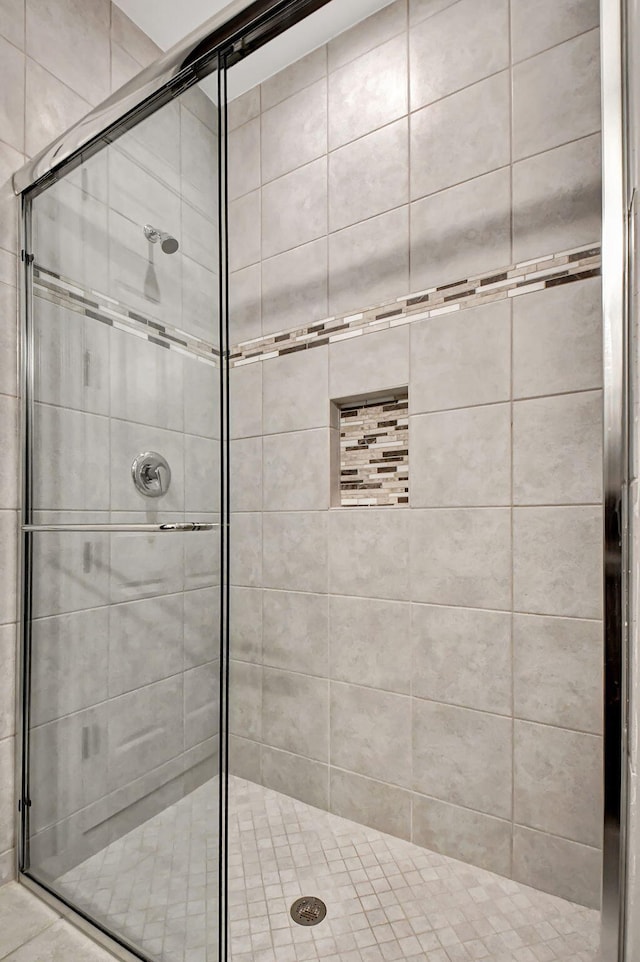 bathroom with an enclosed shower