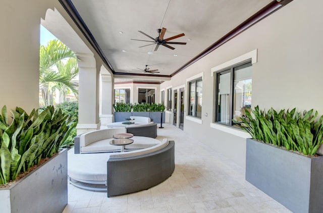 view of patio / terrace featuring ceiling fan