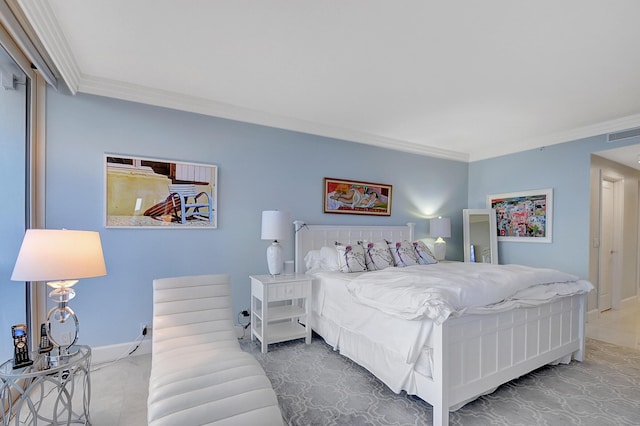 bedroom featuring crown molding