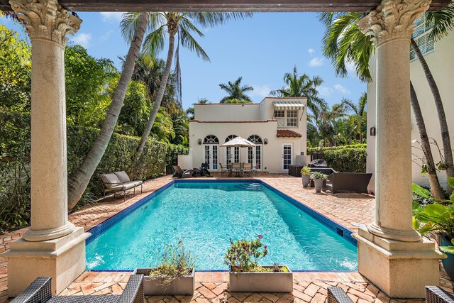 view of pool featuring a patio area