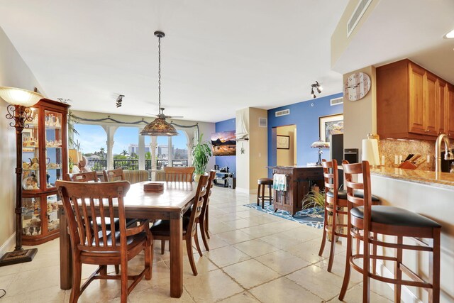 dining space with sink