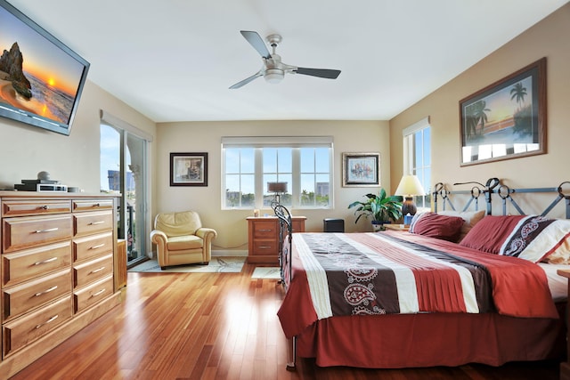 bedroom with ceiling fan and light hardwood / wood-style floors