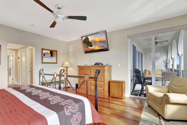 bedroom with hardwood / wood-style flooring and ceiling fan