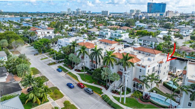 birds eye view of property featuring a water view