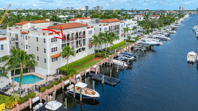 drone / aerial view with a water view