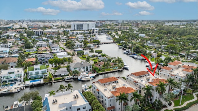 aerial view featuring a residential view and a water view