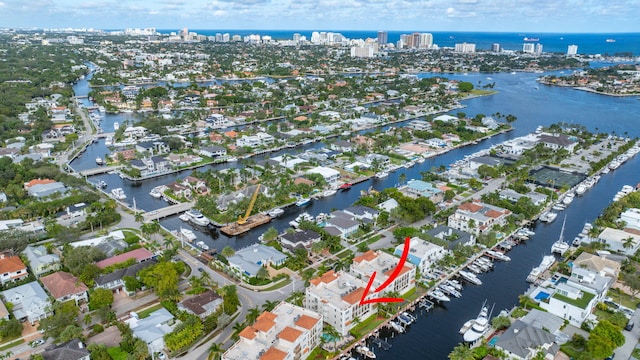 birds eye view of property featuring a water view