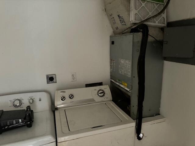 washroom with washer and dryer and hookup for an electric dryer