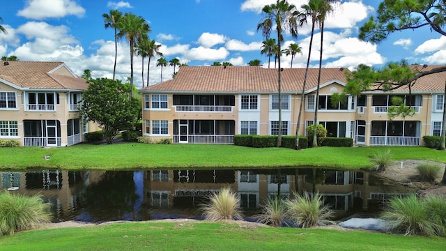 view of building exterior featuring a water view