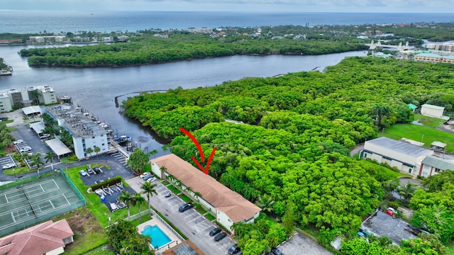 drone / aerial view with a water view