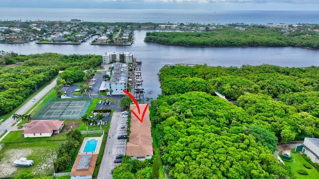 birds eye view of property featuring a water view