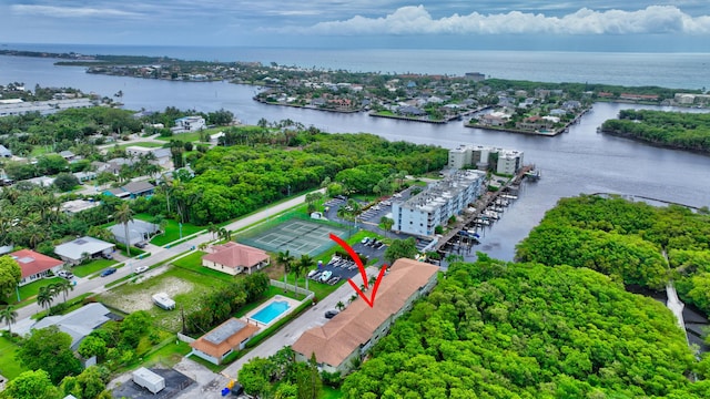 birds eye view of property featuring a water view