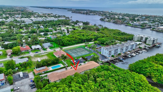 birds eye view of property featuring a water view