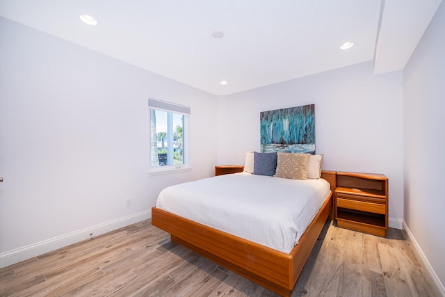 bedroom featuring light hardwood / wood-style flooring