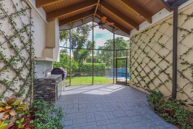 view of patio / terrace featuring an outdoor kitchen, sink, and grilling area