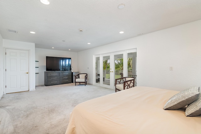 bedroom featuring light carpet, visible vents, access to exterior, french doors, and recessed lighting