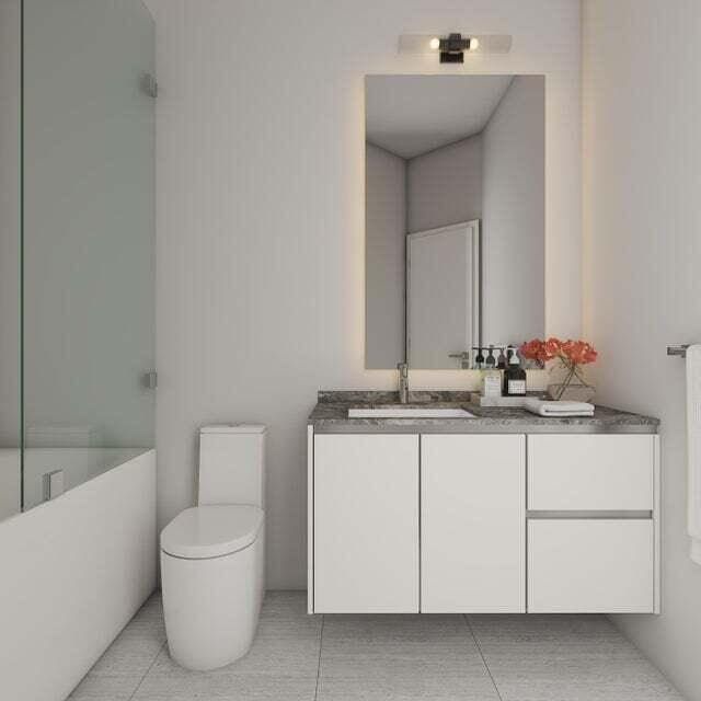 bathroom featuring tile flooring, vanity, and toilet